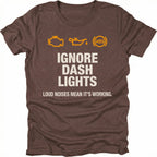 Espresso t-shirt with dashboard warning icons and the text Ignore Dash Lights Loud Noises Mean It’s Working, front view by Trail Snark.