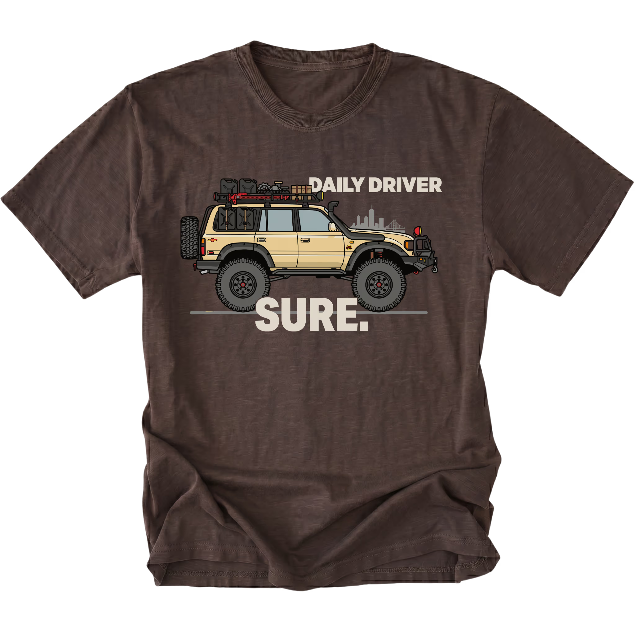 Espresso t-shirt featuring a built off-road vehicle with daily driver sure text graphic shown from the front by Trail Snark.