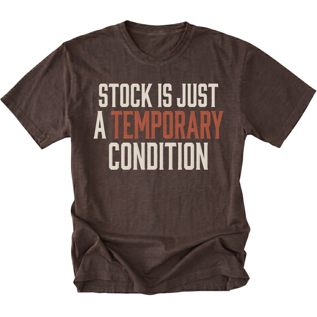 A dark brown short-sleeve t-shirt with a distressed graphic reading 'STOCK IS JUST A TEMPORARY CONDITION' in cream and muted orange text, displayed on a solid white background.
