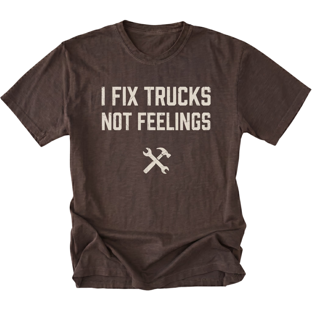 Espresso t-shirt with bold distressed text reading I Fix Trucks Not Feelings and crossed wrench and hammer icon.