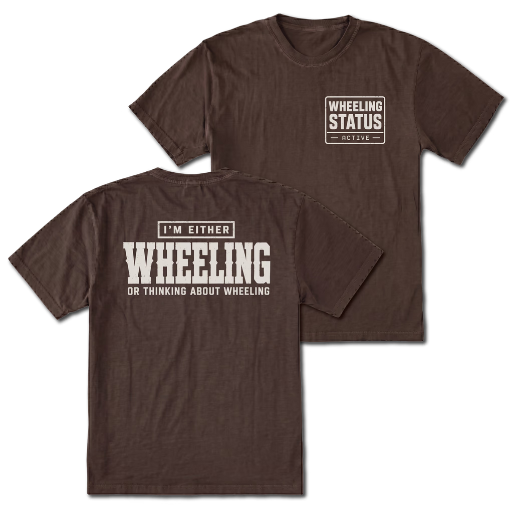Espresso T-shirt with I'm Either Wheeling Or Thinking About Wheeling back design and Wheeling Status front chest print by Trail Snark.
