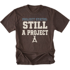 An Espresso Brown T-Shirt featuring the Still A Project design on the front by Trail Snark.