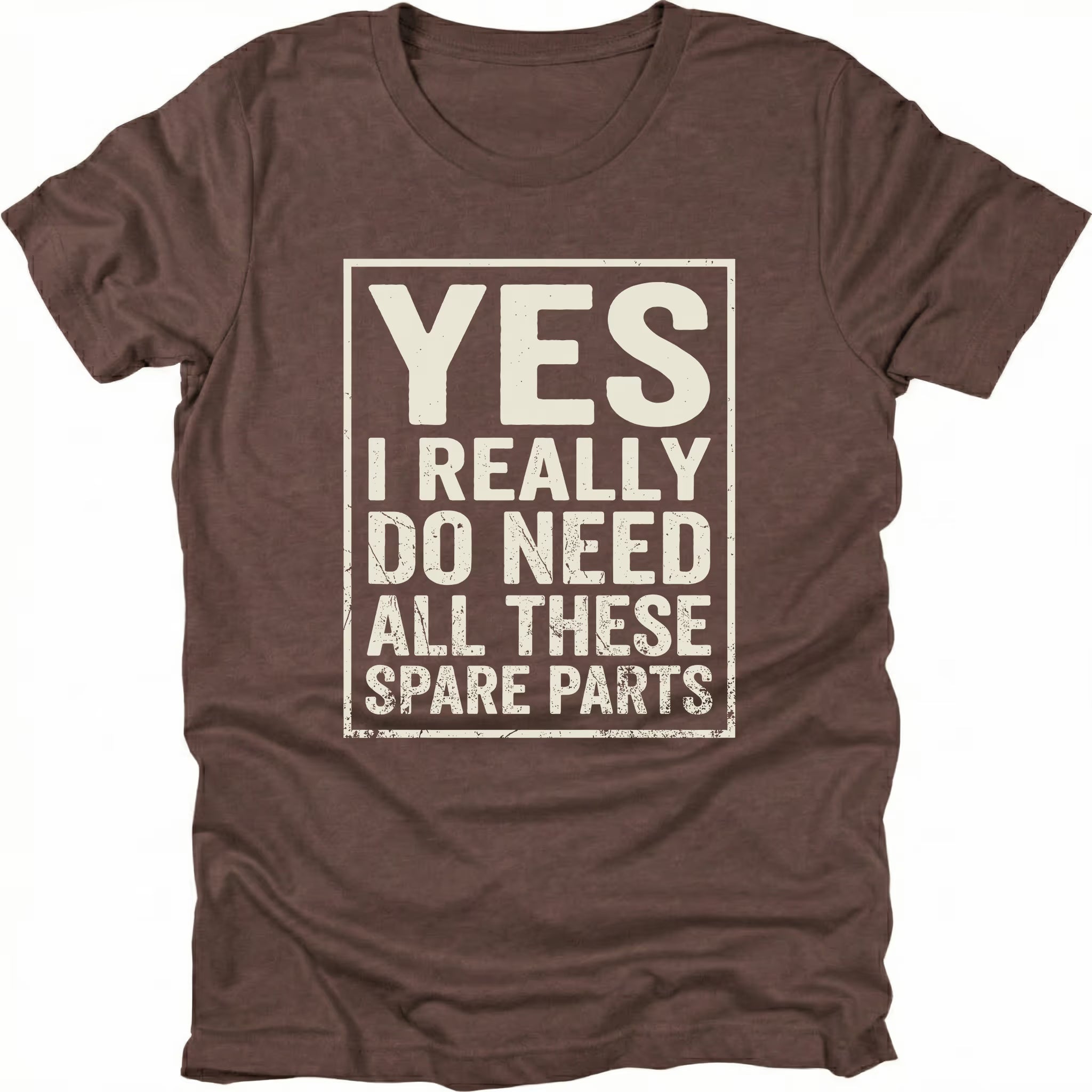 Espresso t-shirt with bold distressed text reading “Yes I Really Do Need All These Spare Parts” in a boxed layout on the front by Trail Snark.