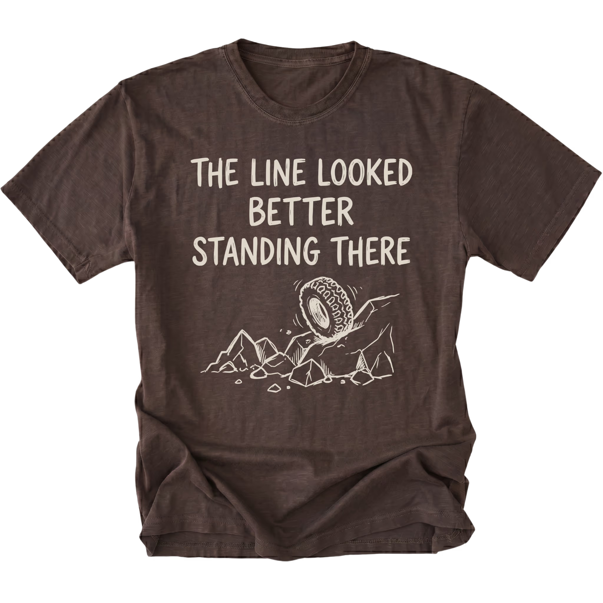Espresso T-Shirt with hand-drawn tire and rocks graphic and text reading “The Line Looked Better Standing There” shown on front view by Trail Snark.