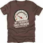 Espresso t-shirt with distressed fuel gauge graphic pointing near empty and text reading My Therapist Takes Premium with Mental Health Low Fuel by Trail Snark.