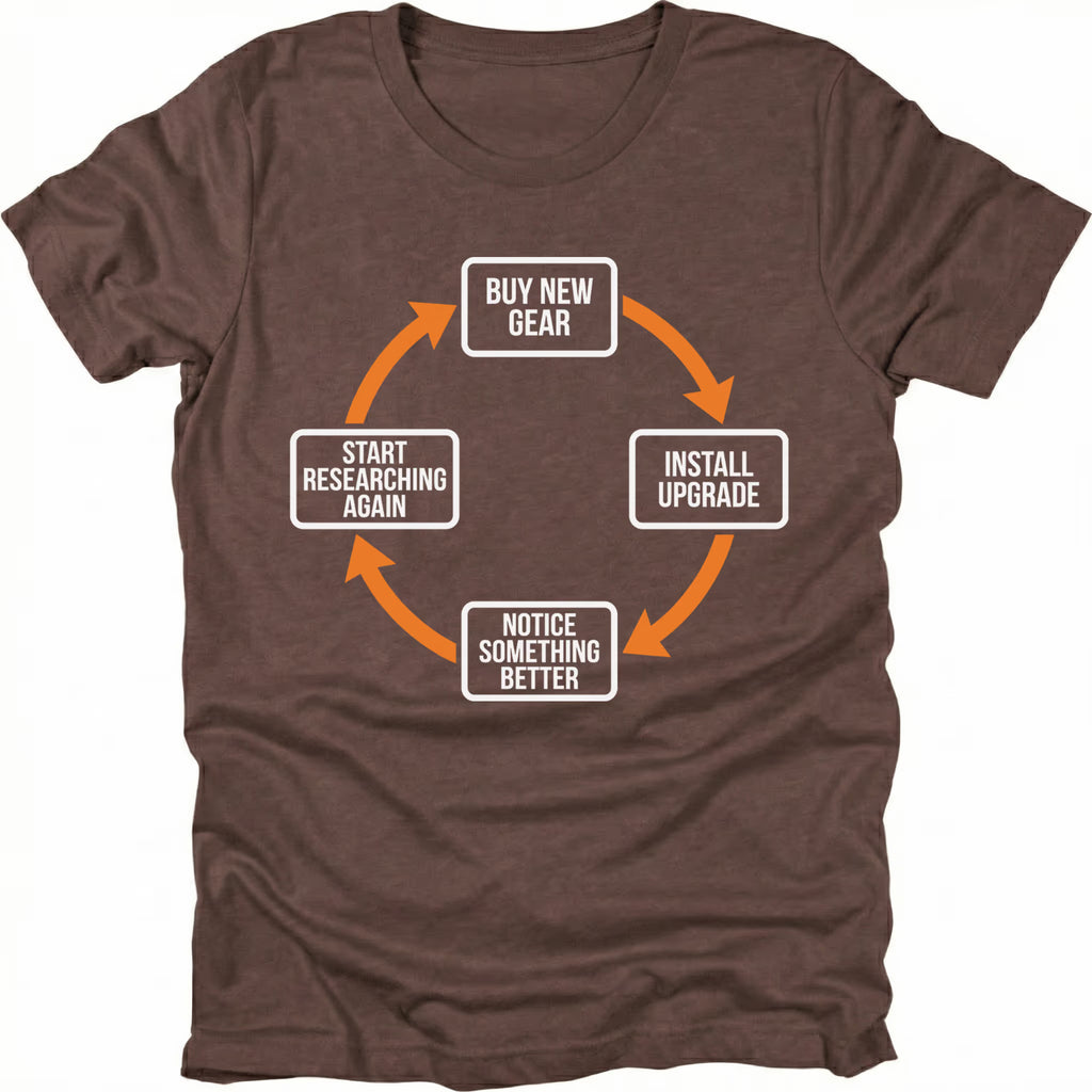 Espresso T-Shirt with upgrade cycle diagram showing buy new gear, install upgrade, notice something better, and start researching again front view by Trail Snark.