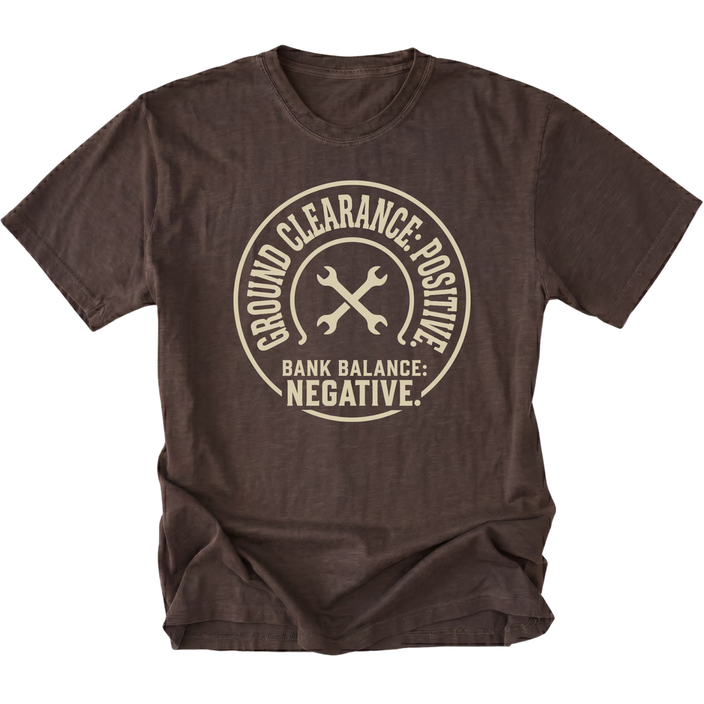 Espresso T-Shirt with the Ground Clearance: Positive. Bank Balance: Negative. design in a front view by Trail Snark.