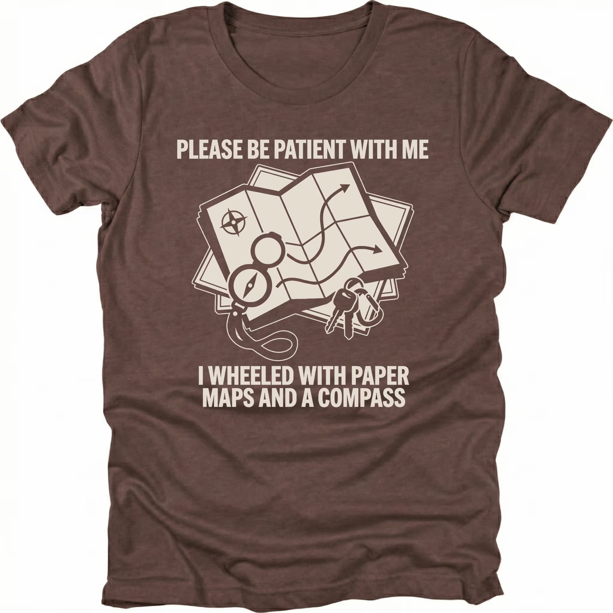 Espresso T-Shirt with paper map and compass graphic reading “Please Be Patient With Me I Wheeled With Paper Maps And A Compass” shown on front view by Trail Snark.