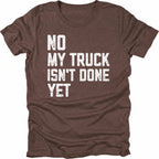 Espresso T-Shirt with distressed white text reading "No My Truck Isn't Done Yet" front view by Trail Snark.