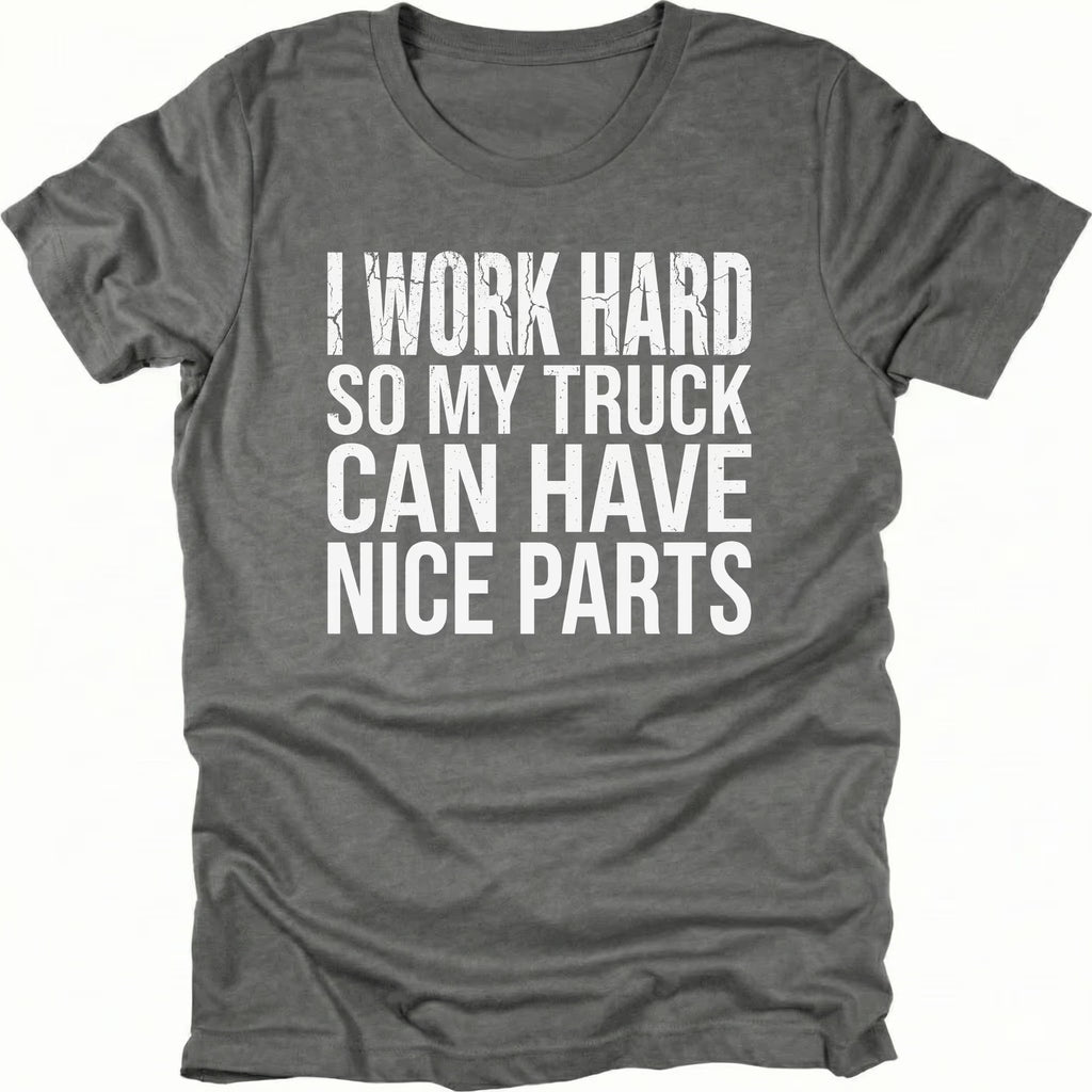 Grey T-Shirt with I Work Hard So My Truck Can Have Nice Parts text design on front view by Trail Snark.