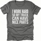 Grey T-Shirt with I Work Hard So My Truck Can Have Nice Parts text design on front view by Trail Snark.