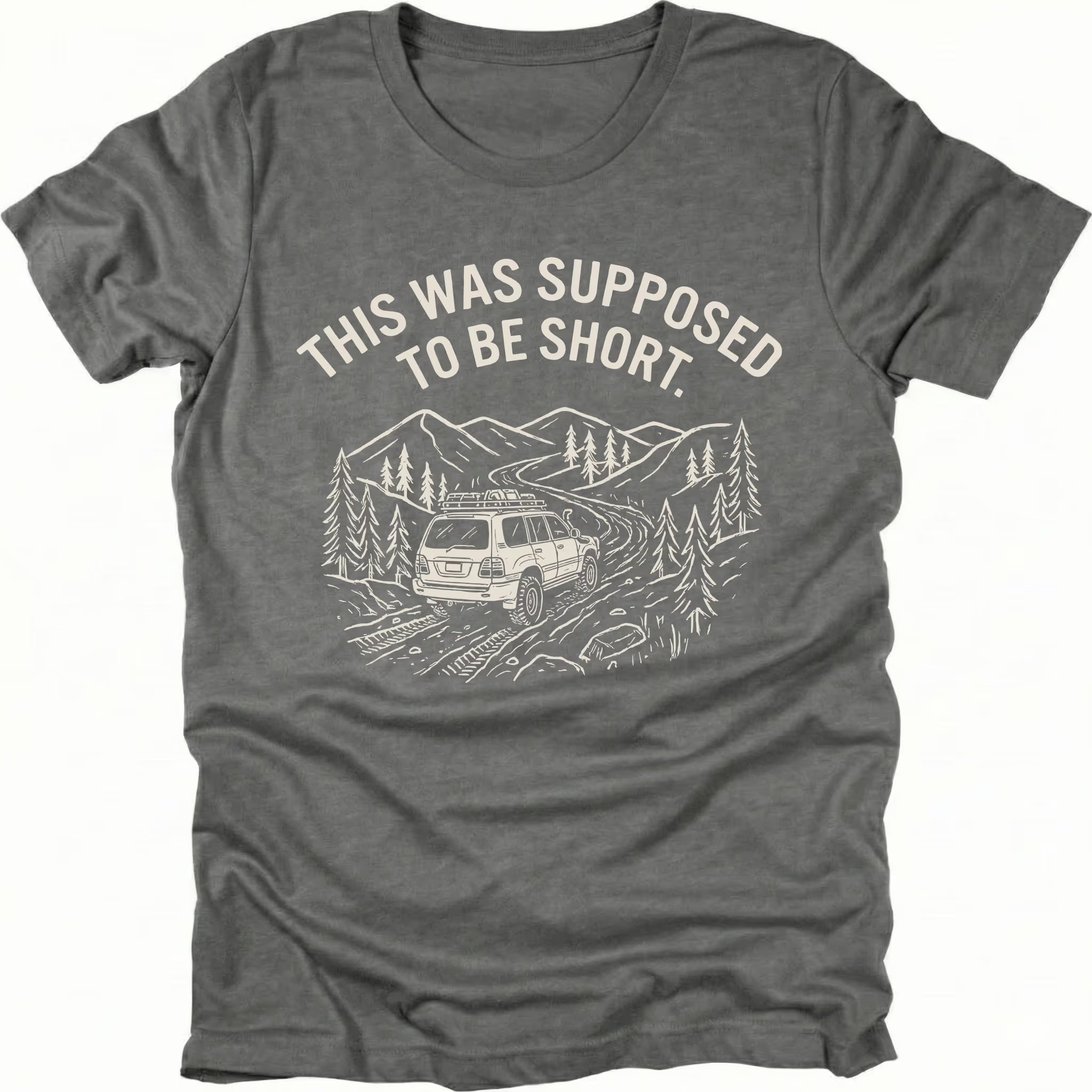 Grey t-shirt with text reading “This Was Supposed to Be Short” above an illustration of an SUV driving a winding forest trail through mountains.