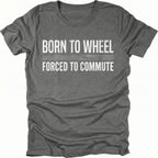 Grey t-shirt featuring born to wheel forced to commute text graphic shown from the front by Trail Snark.