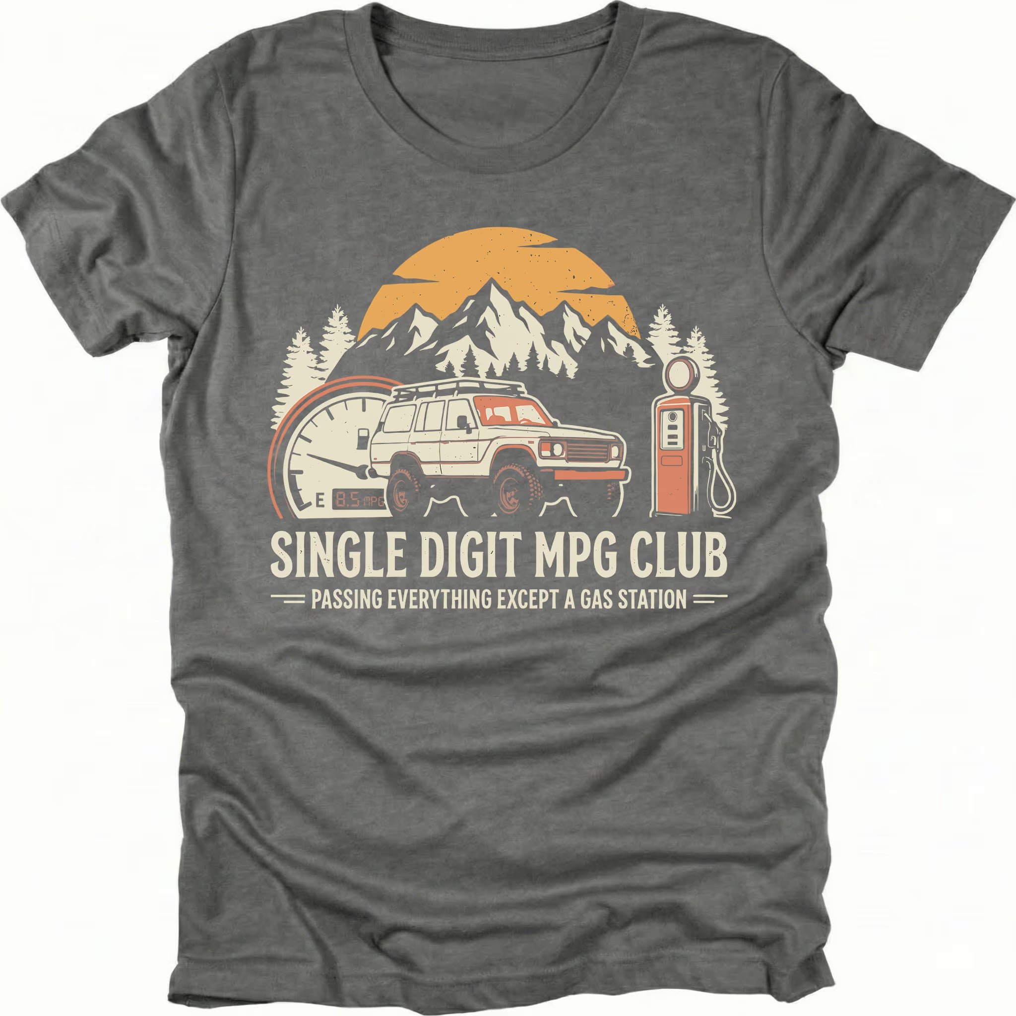 Grey t-shirt featuring an offroad vehicle, mountains, fuel gauge, and gas pump graphic with text reading “Single Digit MPG Club – Passing Everything Except a Gas Station.”
