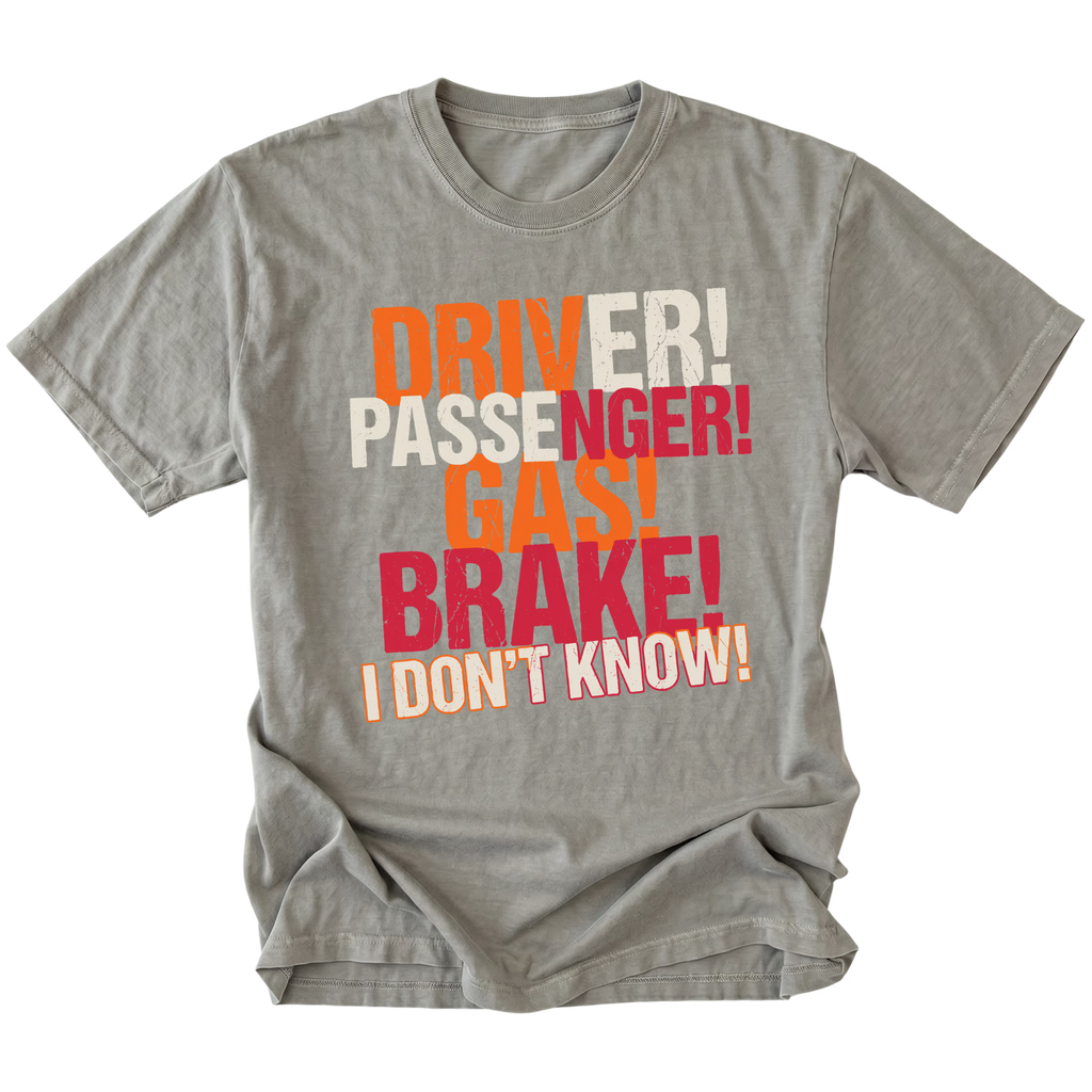 Grey t-shirt featuring driver passenger gas brake i dont know bold stacked text graphic shown from the front by Trail Snark.