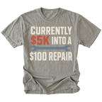 Grey T-Shirt featuring the five-thousand-dollar repair design on the front by Trail Snark.