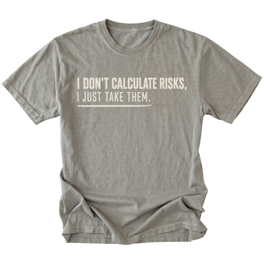 Grey T-shirt featuring the Risk Taker design on the front by Trail Snark.