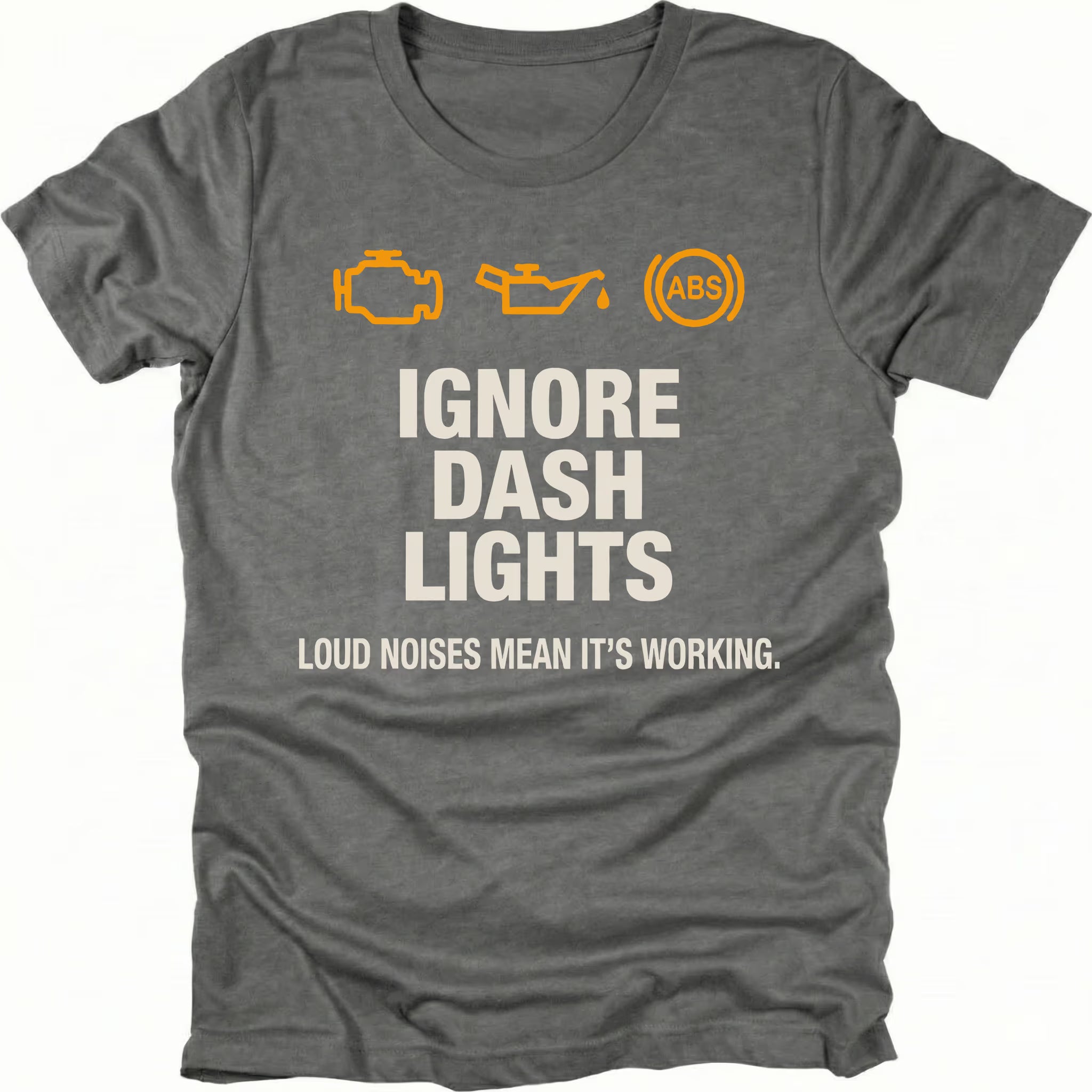 Grey t-shirt with dashboard warning icons and the text Ignore Dash Lights Loud Noises Mean It’s Working, front view by Trail Snark.