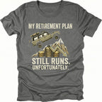 grey t-shirt featuring an off-road vehicle climbing over coins and a downward graph with text reading My Retirement Plan Still Runs Unfortunately, front view by Trail Snark.