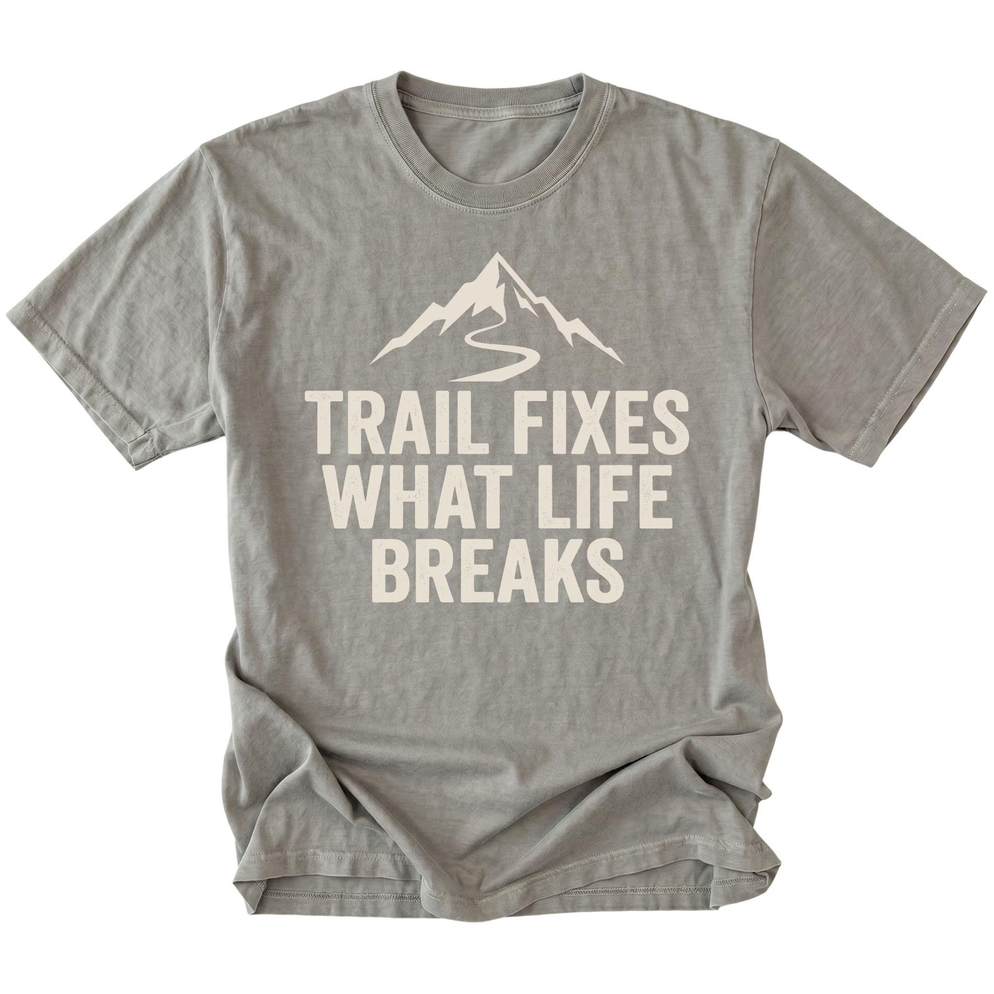 Grey t-shirt with the phrase “Trail Fixes What Life Breaks” beneath a mountain and winding trail graphic printed on the front.