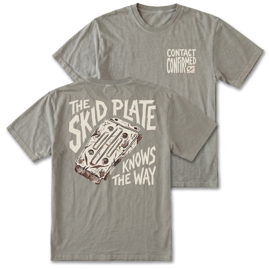 A gray t-shirt shown from both the front and back. The front features a small beige graphic on the left chest reading 'CONTACT CONFIRMED' with a small flag.