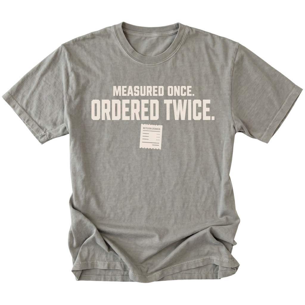 Grey T-shirt with a Measured Once Ordered Twice garage humor design shown from the front by Trail Snark.