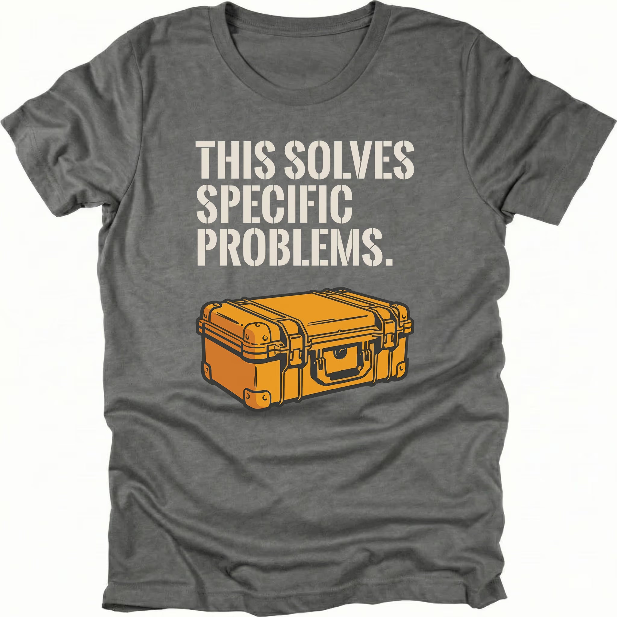 Grey t-shirt with text reading “This Solves Specific Problems” above an illustrated orange hard gear case, shown in front view.