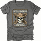 Grey T-Shirt with skull and crossed traction boards reading “Overland Or Die No Pavement Beyond This Point” shown on front view by Trail Snark.