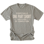 Grey T-shirt with a Perpetually One Part Short Of Completion garage build design shown from the front by Trail Snark.