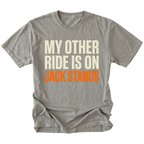Grey t-shirt with My Other Ride Is On Jack Stands text design shown front view by Trail Snark.