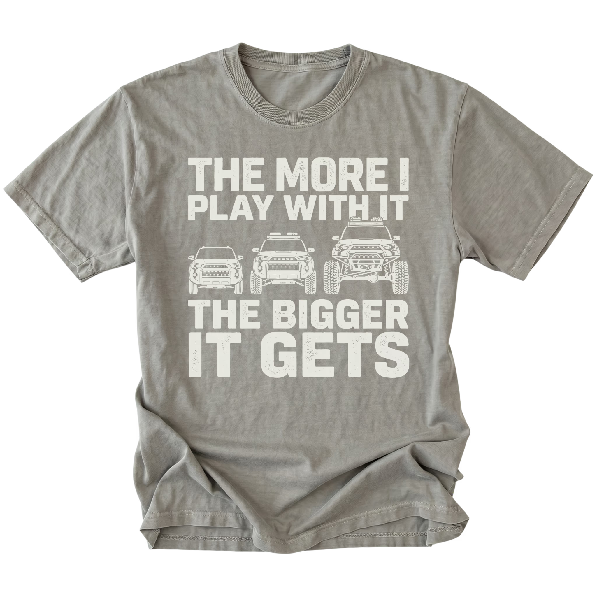 Grey T-Shirt featuring The More I Play With It The Bigger It Gets design with three progressively modified Toyota 4Runner style SUVs on the front view by Trail Snark.