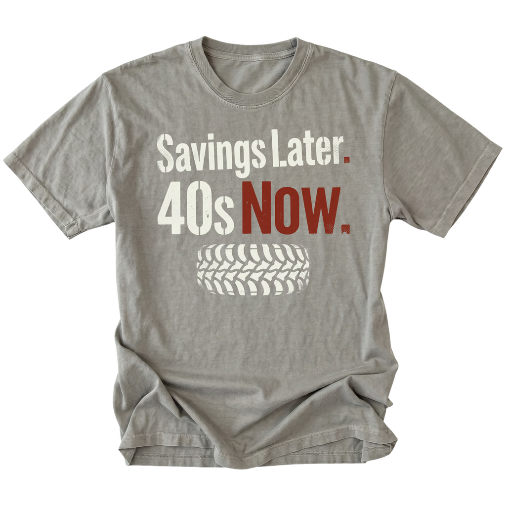 Grey T-Shirt featuring Savings Later 40s Now design with large off-road tire graphic on front view by Trail Snark.