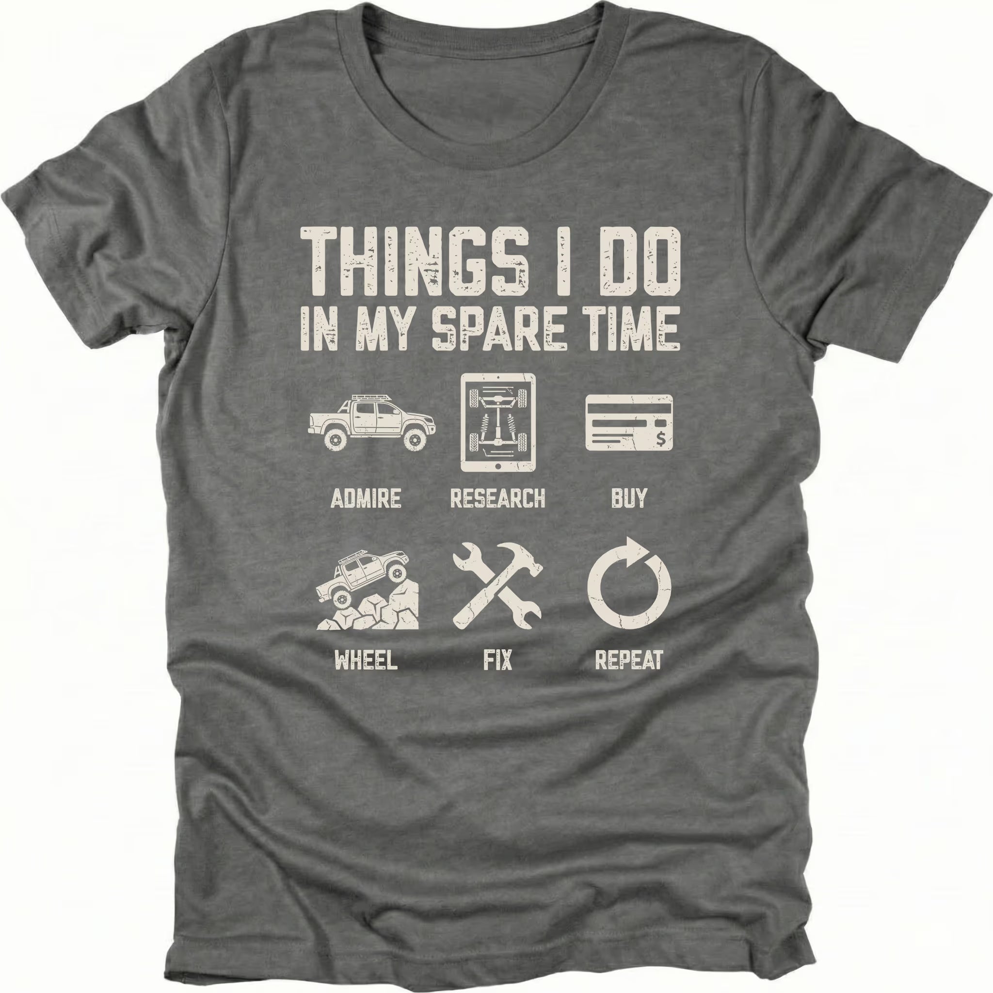Grey T-Shirt with icons and text reading “Things I Do In My Spare Time” showing admire research buy wheel fix repeat on front view by Trail Snark.