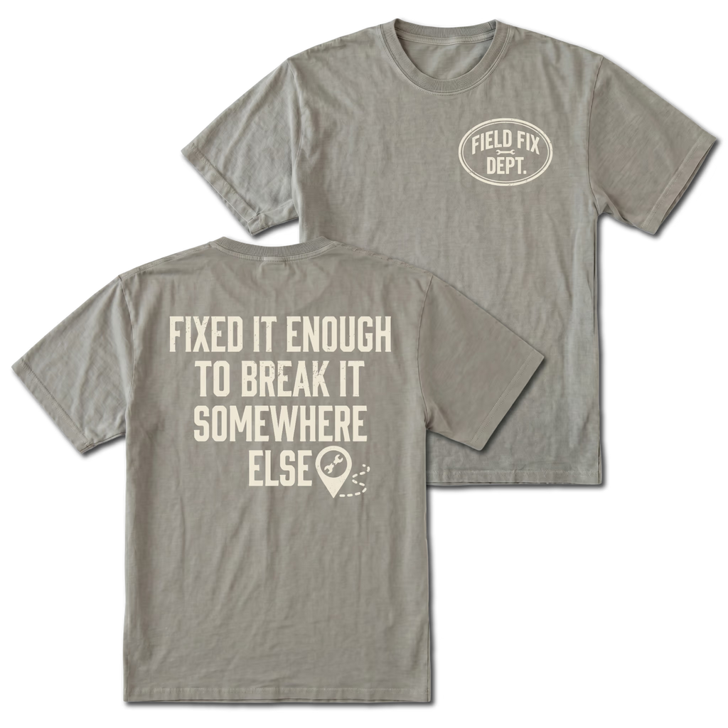 Grey T-shirt with Fixed It Enough To Break It Somewhere Else back design and Field Fix Dept. front chest print by Trail Snark.