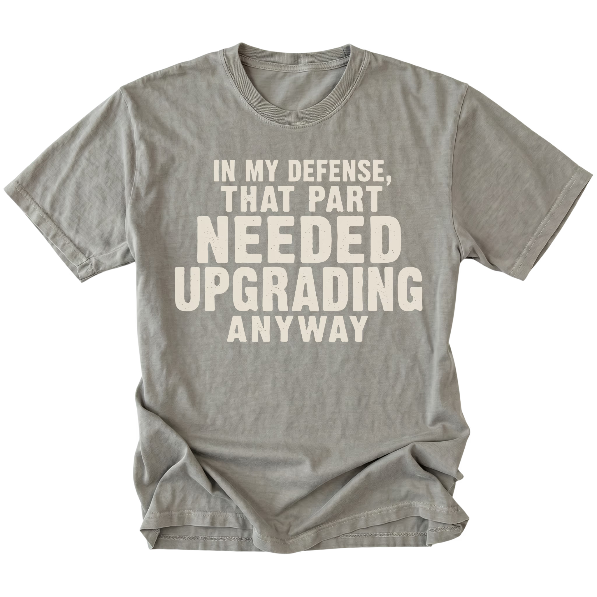 Grey t-shirt featuring the Needed Upgrading design on the front by Trail Snark.