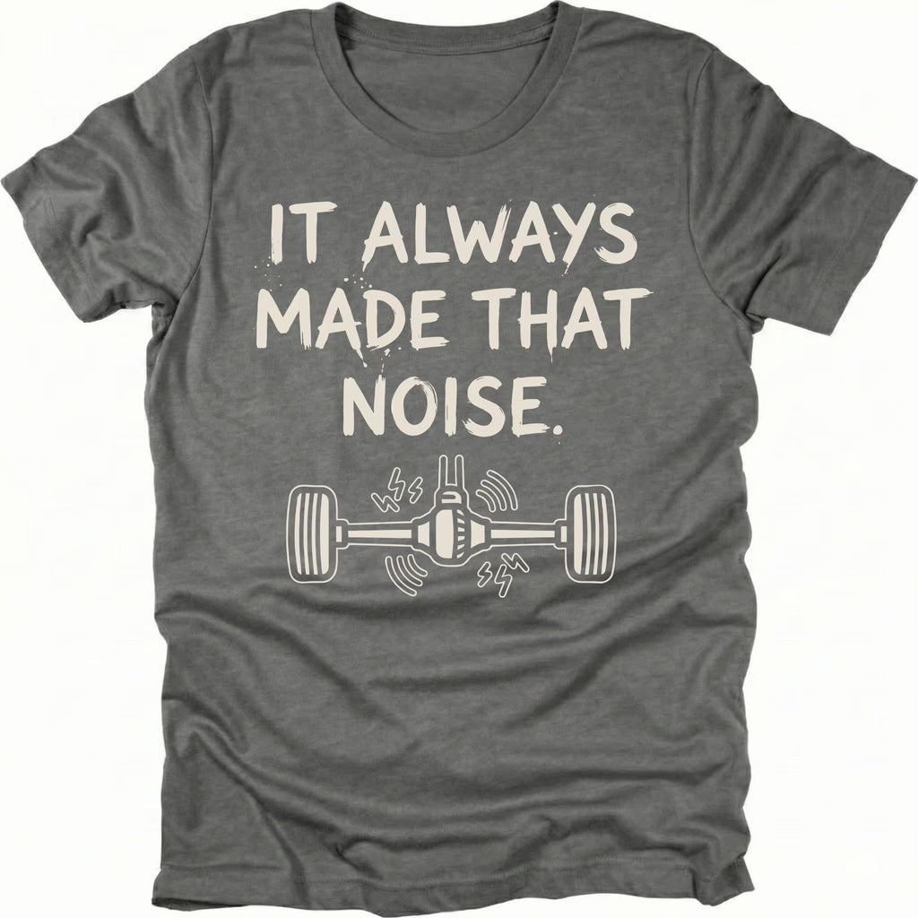 Grey t-shirt with the phrase It Always Made That Noise and a line-art axle illustration, front view by Trail Snark.