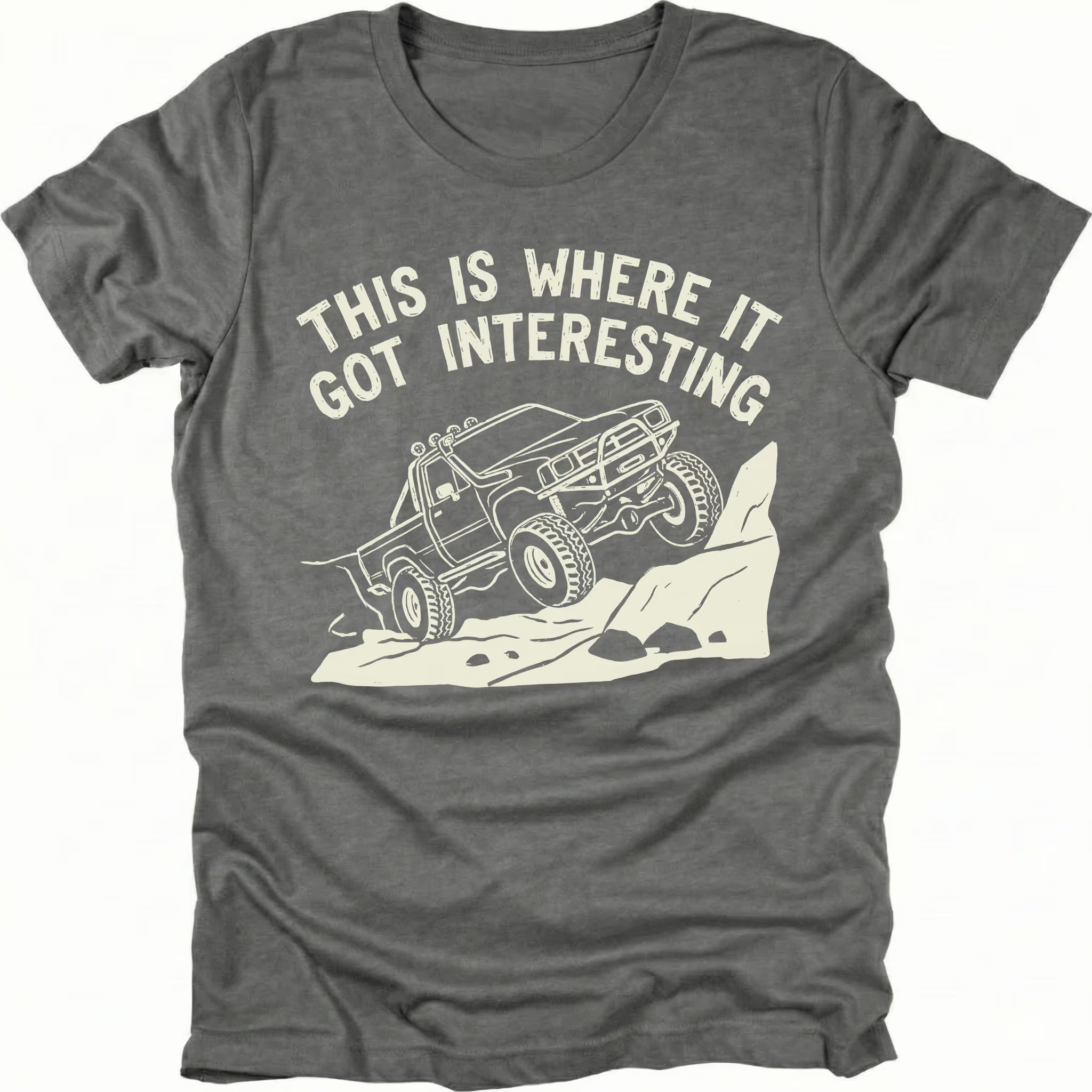 Grey T-Shirt with off-road truck climbing rocks and text reading “This Is Where It Got Interesting” shown on front view by Trail Snark.