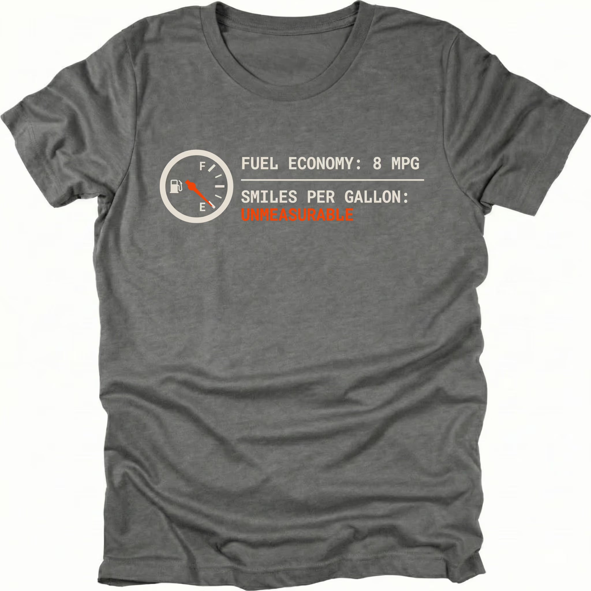Grey t-shirt featuring a fuel gauge graphic with text reading fuel economy 8 MPG and smiles per gallon unmeasurable displayed on the front.