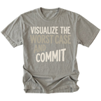 A gray short-sleeve t-shirt with a graphic text print reading 'VISUALIZE THE WORST CASE AND COMMIT' in cream and light beige lettering, displayed flat against a solid white background.