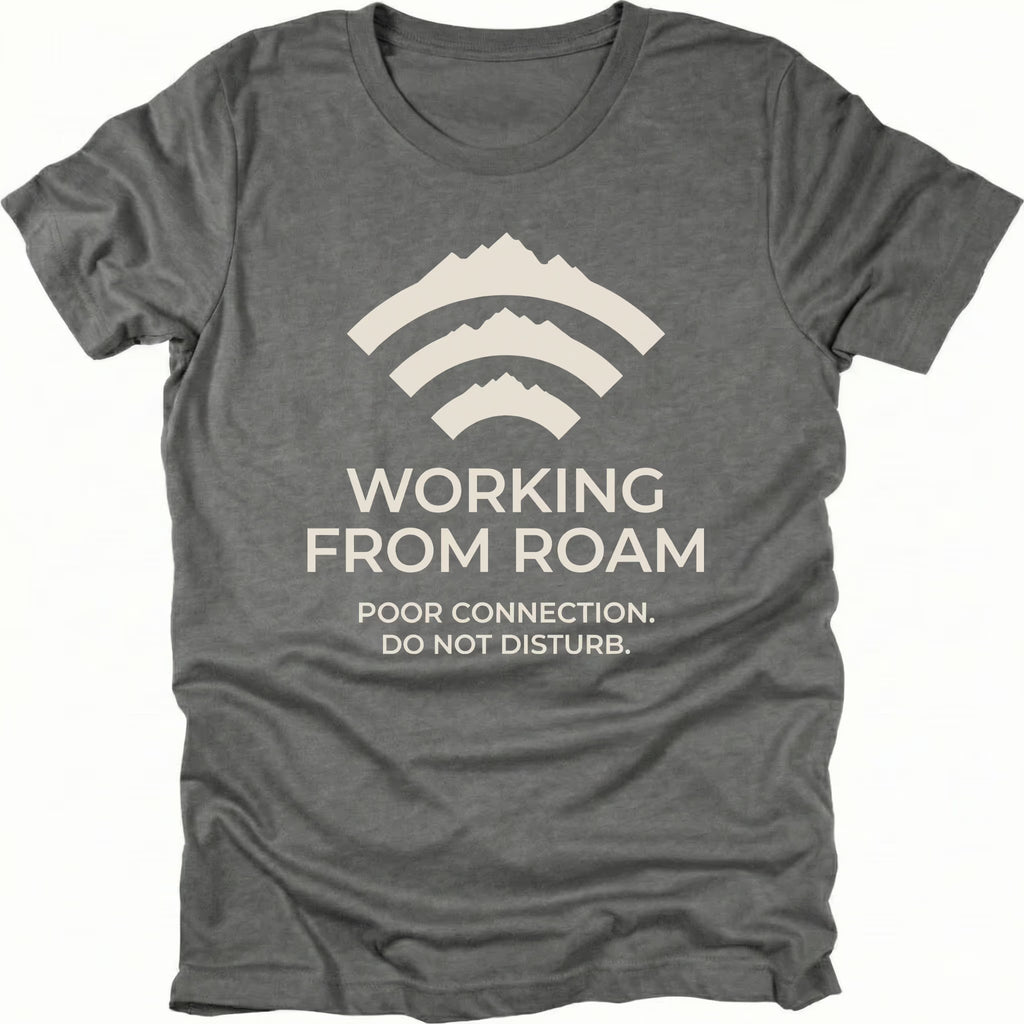 Grey t-shirt with mountain wifi icon and text reading “Working From Roam – Poor Connection. Do Not Disturb.” front view by Trail Snark.
