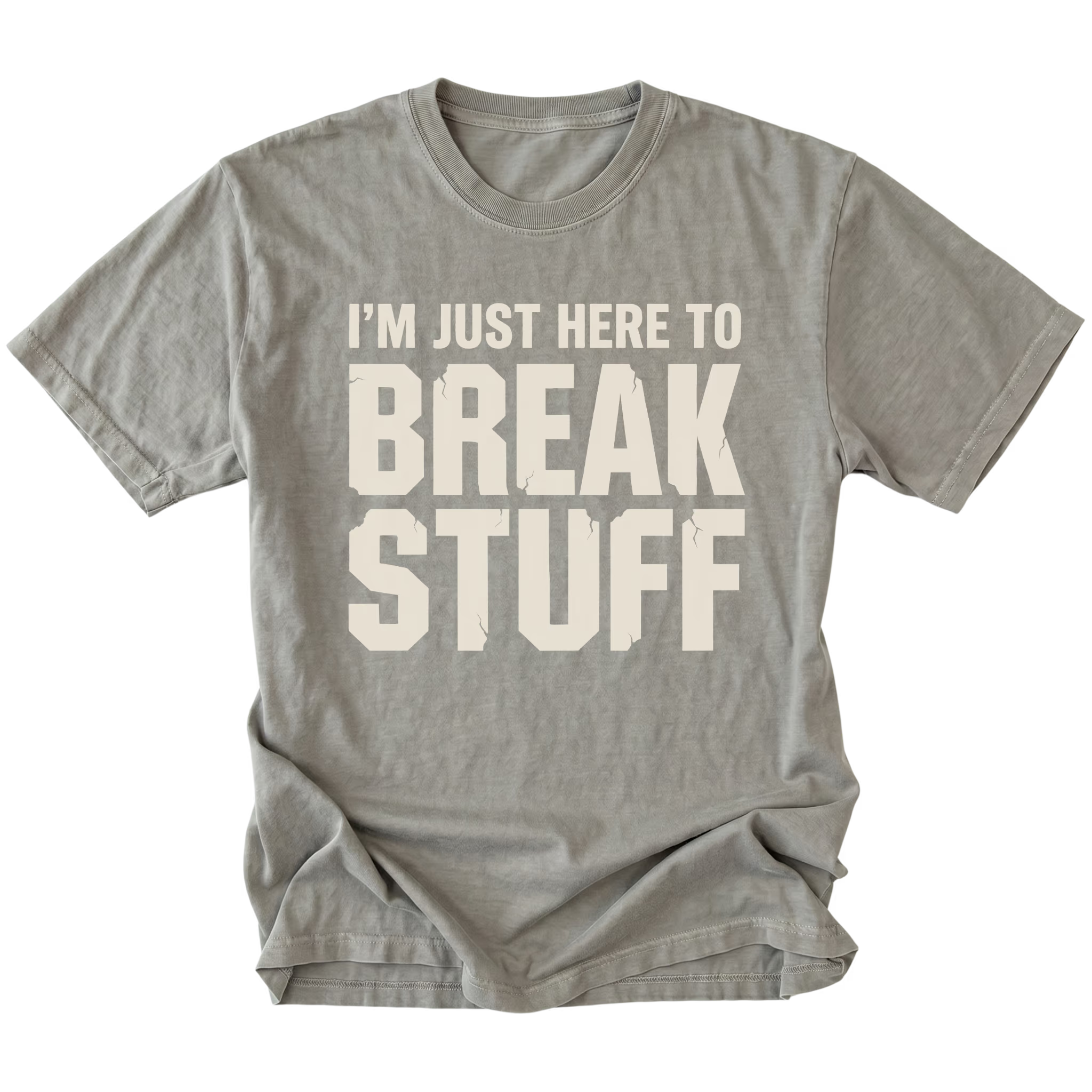 Grey t-shirt with bold distressed text reading I’m Just Here To Break Stuff, front view by Trail Snark.