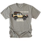 Grey t-shirt featuring a built off-road vehicle with daily driver sure text graphic shown from the front by Trail Snark.