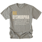 A gray short-sleeve t-shirt with a humorous graphic print on the front. The text reads 'RIG DYSMORPHIA' in gold and white, followed by a definition in white typewriter font.