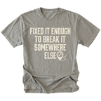 Grey t-shirt featuring Fixed It Enough To Break It Somewhere Else design on front view by Trail Snark.
