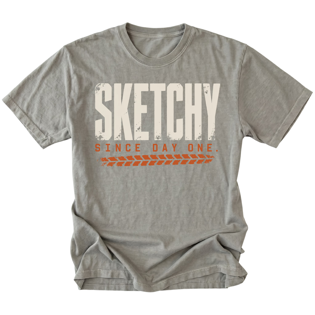 Grey T-shirt featuring the Sketchy Since Day One design on the front by Trail Snark.