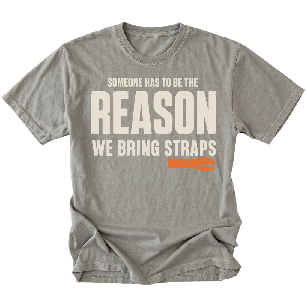 Grey T-shirt featuring the Bring Straps recovery design on the front by Trail Snark.