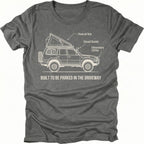 Grey t-shirt featuring built to be parked in the driveway vehicle diagram graphic shown from the front by Trail Snark.