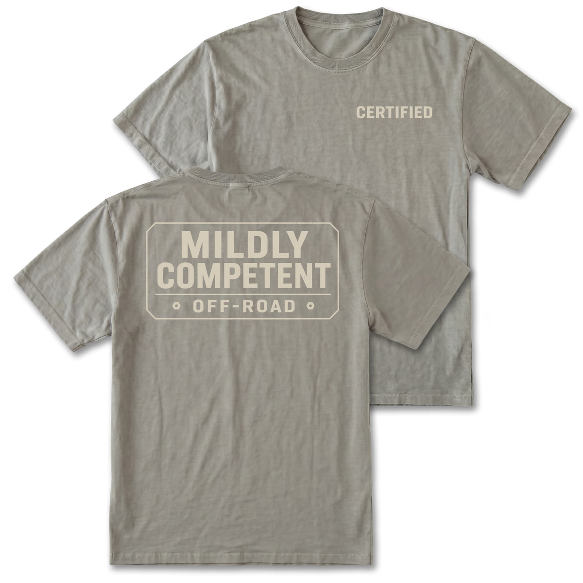 Two gray t-shirts shown on a white background, displaying the front and back designs. The front shirt features the word 'CERTIFIED' printed in beige on the left chest, while the back shirt features a large rectangular graphic with the text 'MILDLY COMPETENT OFF-ROAD' in beige.