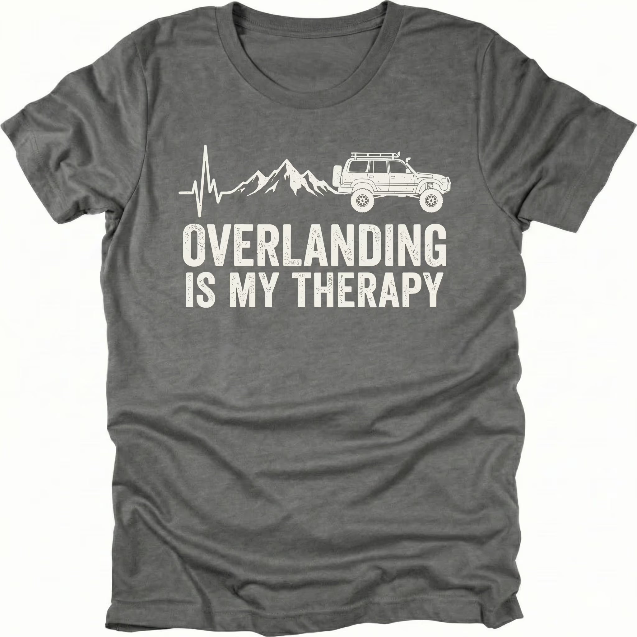 Grey T-Shirt with heartbeat line, mountains, and vehicle graphic reading “Overlanding Is My Therapy” shown on front view by Trail Snark.