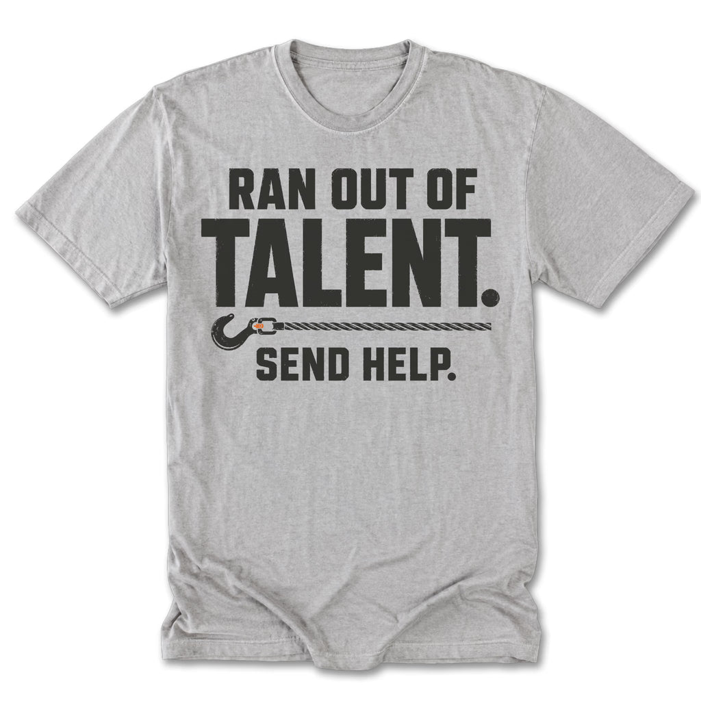 A light heather gray short-sleeve t-shirt with a black graphic print that reads 'RAN OUT OF TALENT. SEND HELP.